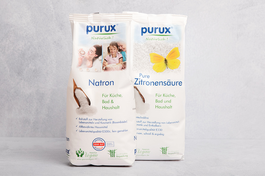 Purux Natron und Zitronensäure
© PurNatur Kempten Produktdarstellung Natron und Zitronensäure von Purux im Großpack nebeneinander stehend